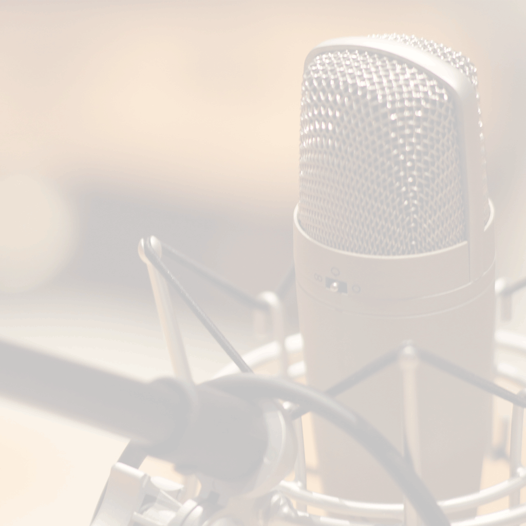 A good example of a background - a plain, faded background image of a microphone.