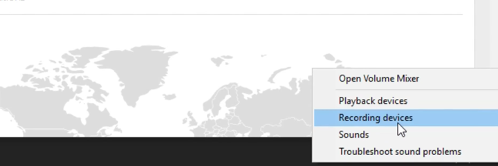 There is a background of a faded world map. In the bottom right of the image is a popup option with a highlighted blue selection of "recording devices"